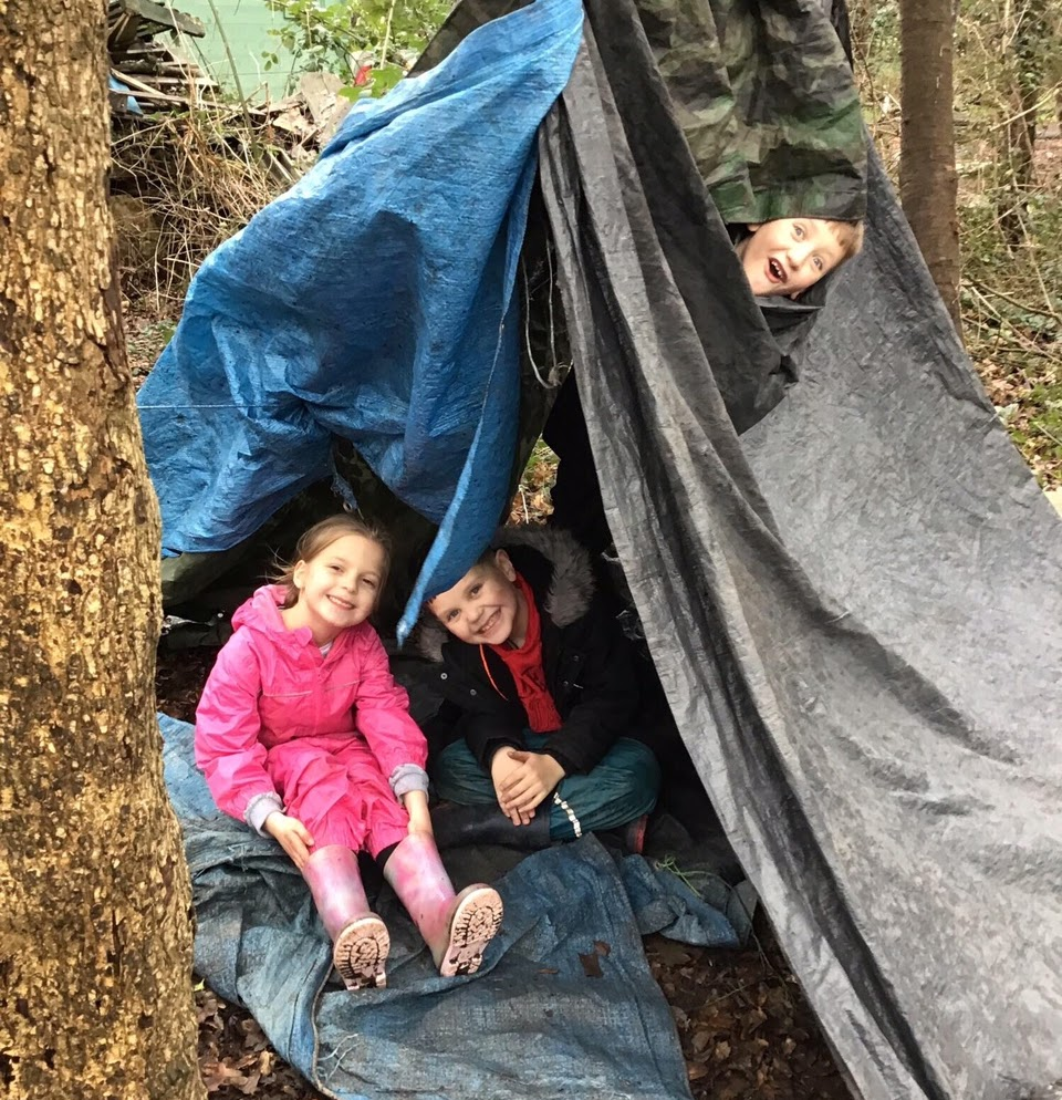 Children under a shelter