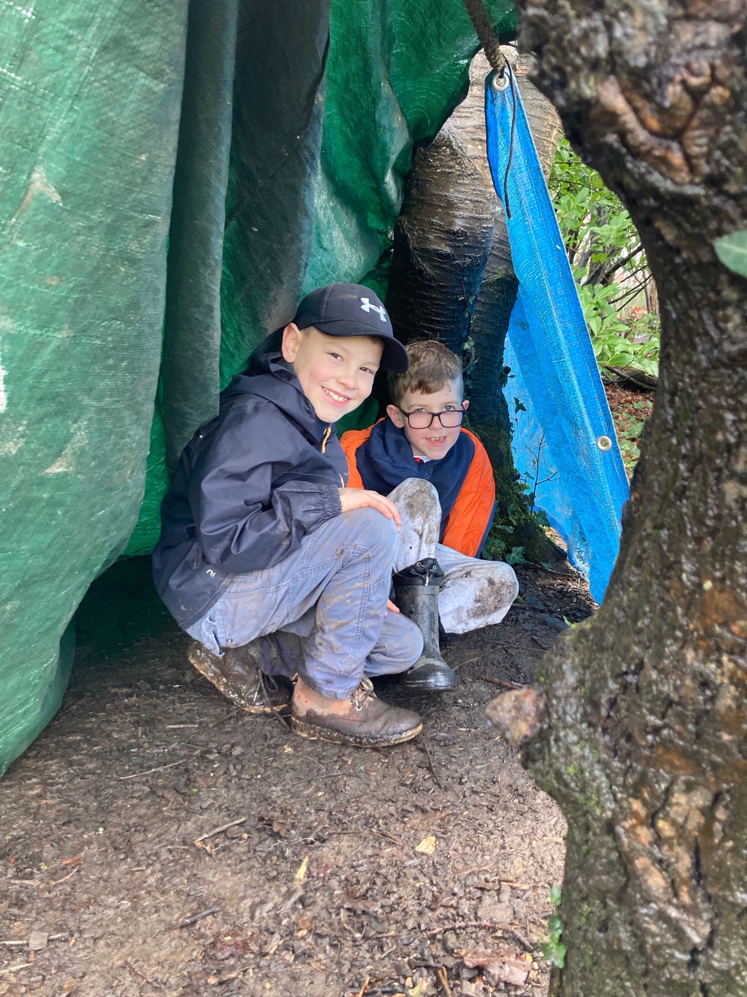 Boys under a shelter