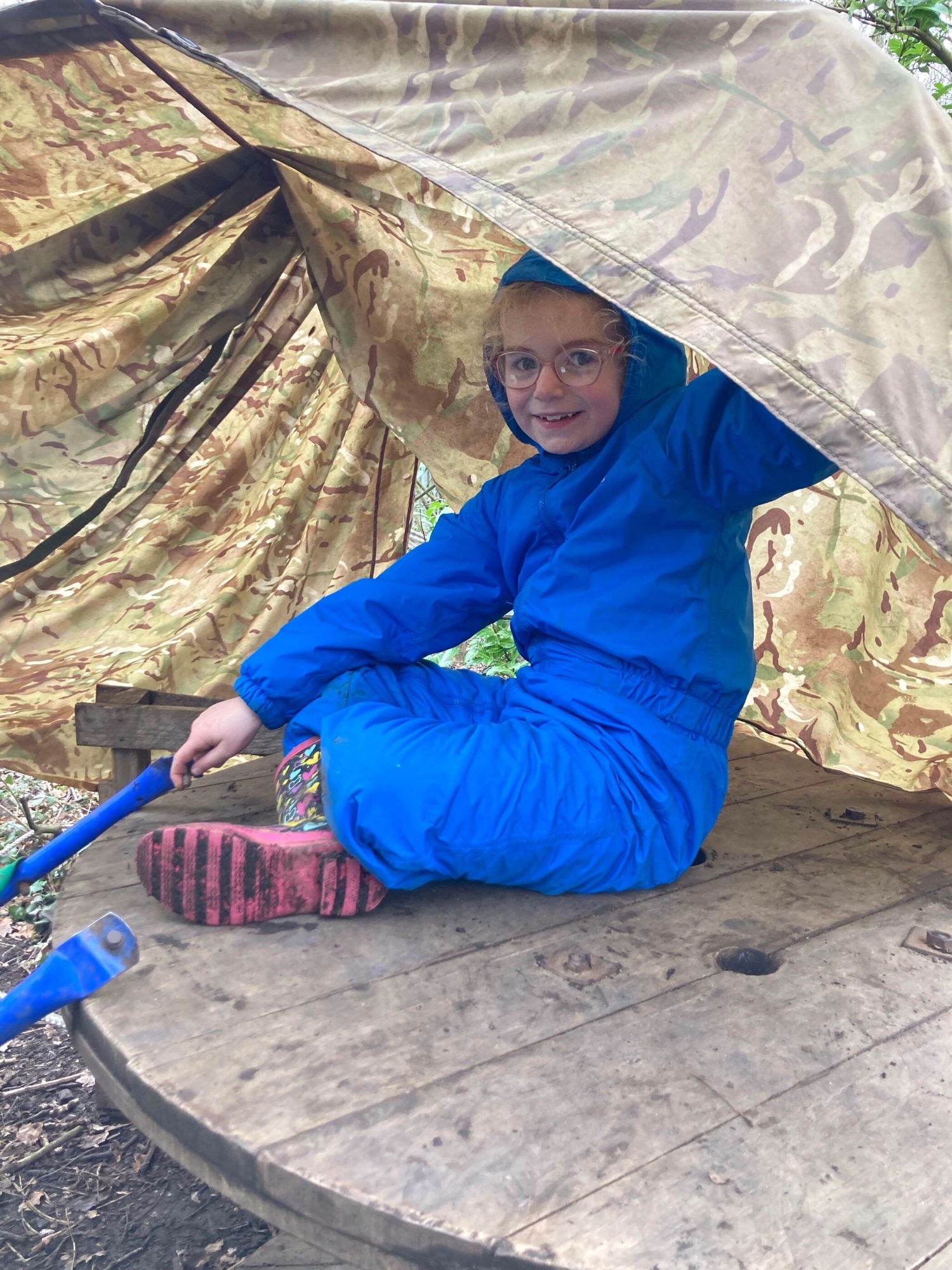 A girl under a shelter